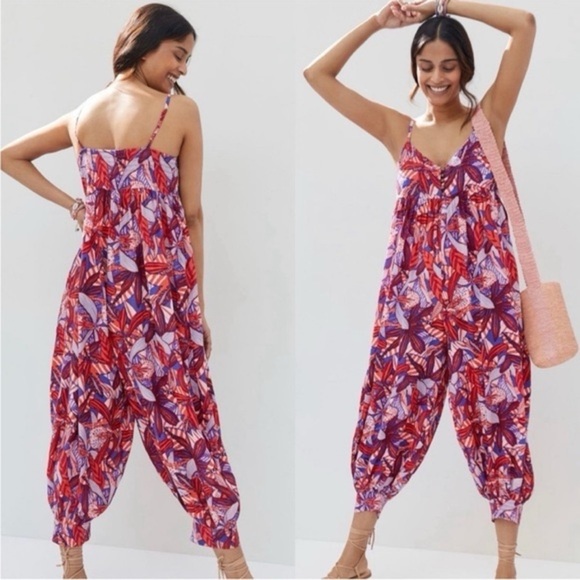 Anthropologie Pants - Anthropologie Claire Colin Abstract Red Purple Harem
Boho Flowy Jumpsuit size L